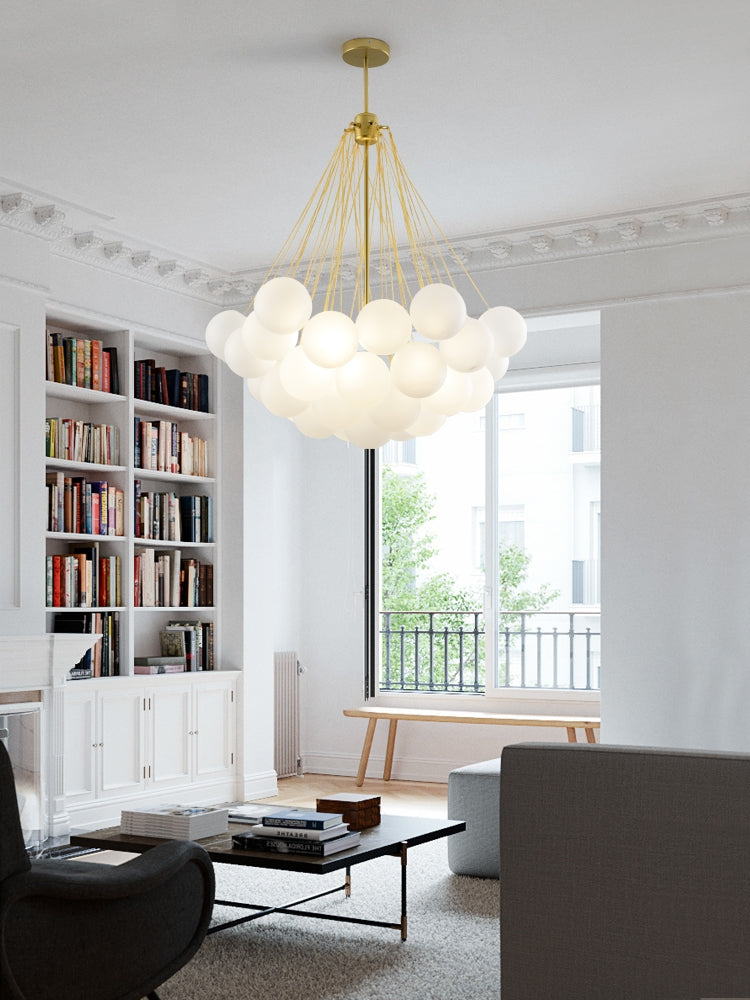 Opaque glass pendant with spherical distribution and metal parts