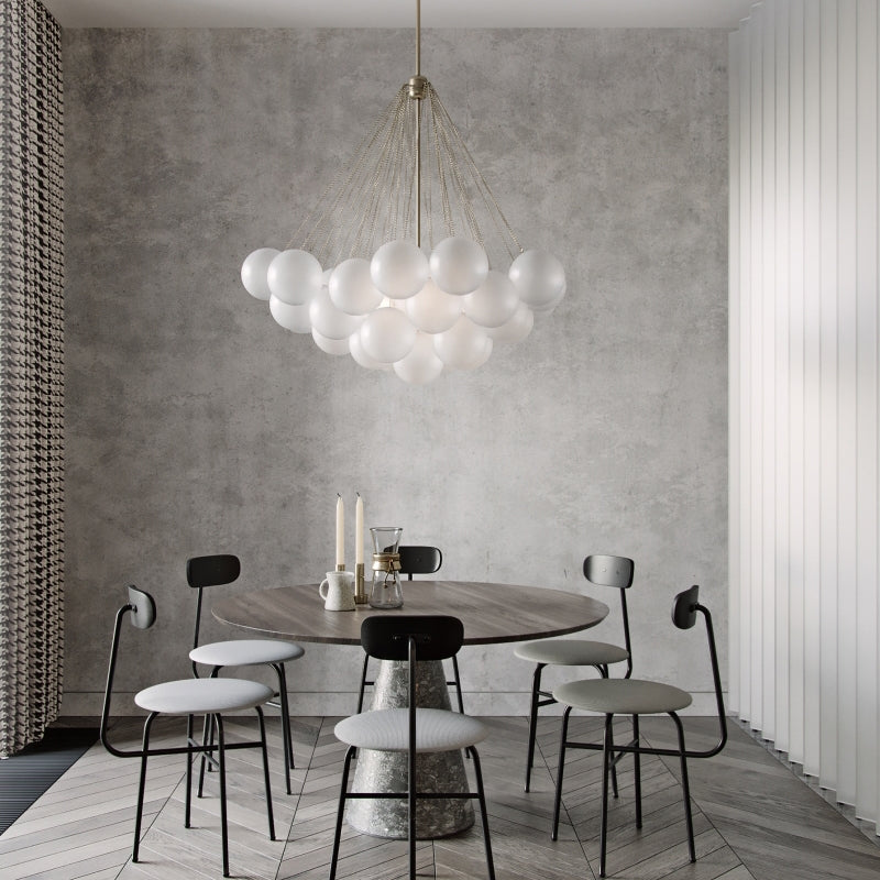 Opaque glass pendant with spherical distribution and metal parts