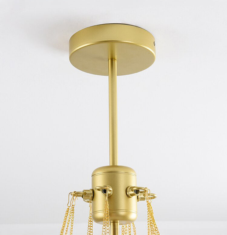 Opaque glass pendant with spherical distribution and metal parts